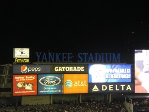 Left of the main scoreboard
